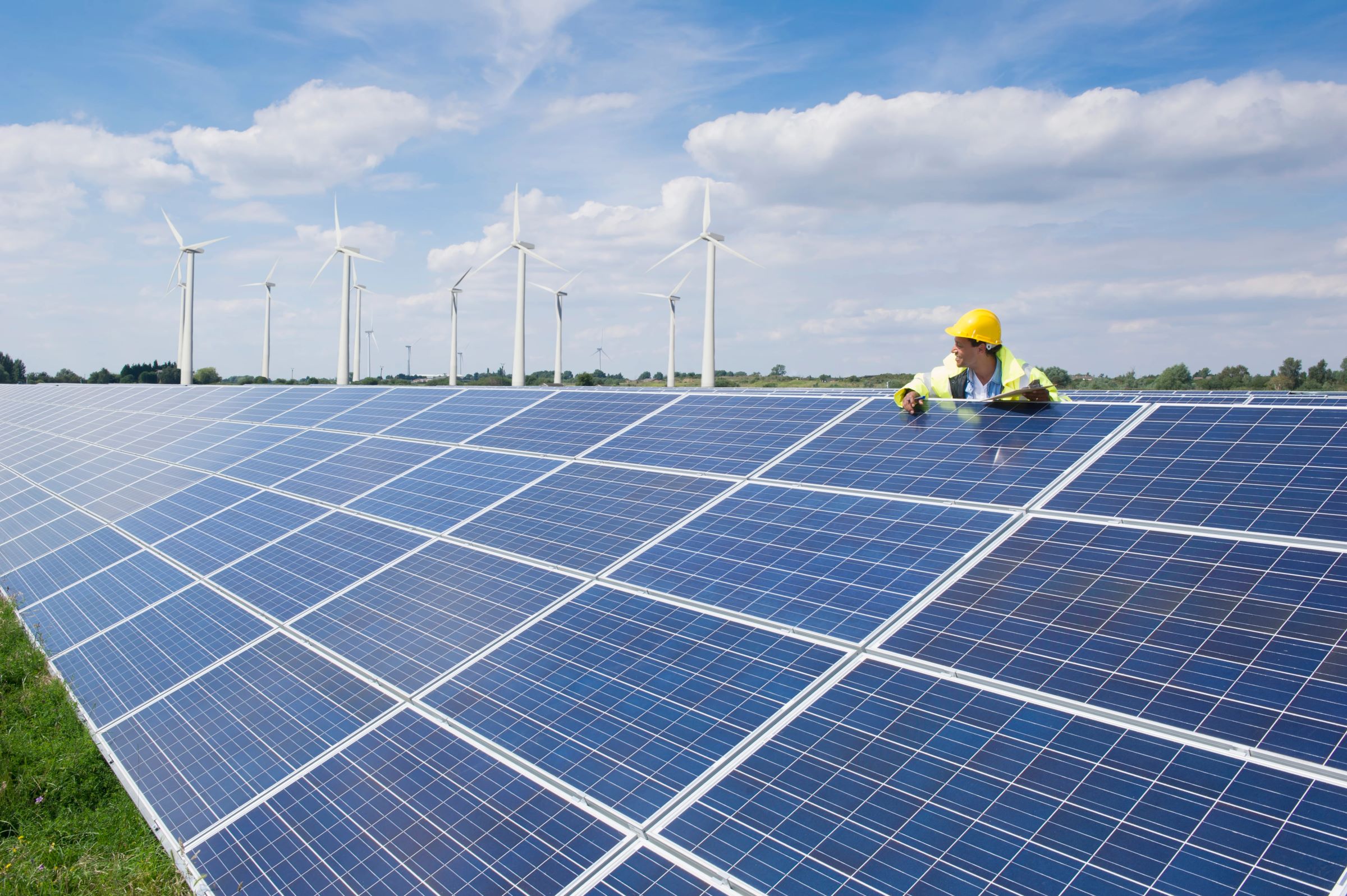 Man checking on solar panels